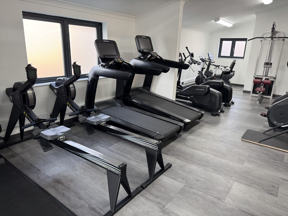 The gym floor at Barton Coast Club, with cardio and resistance machines